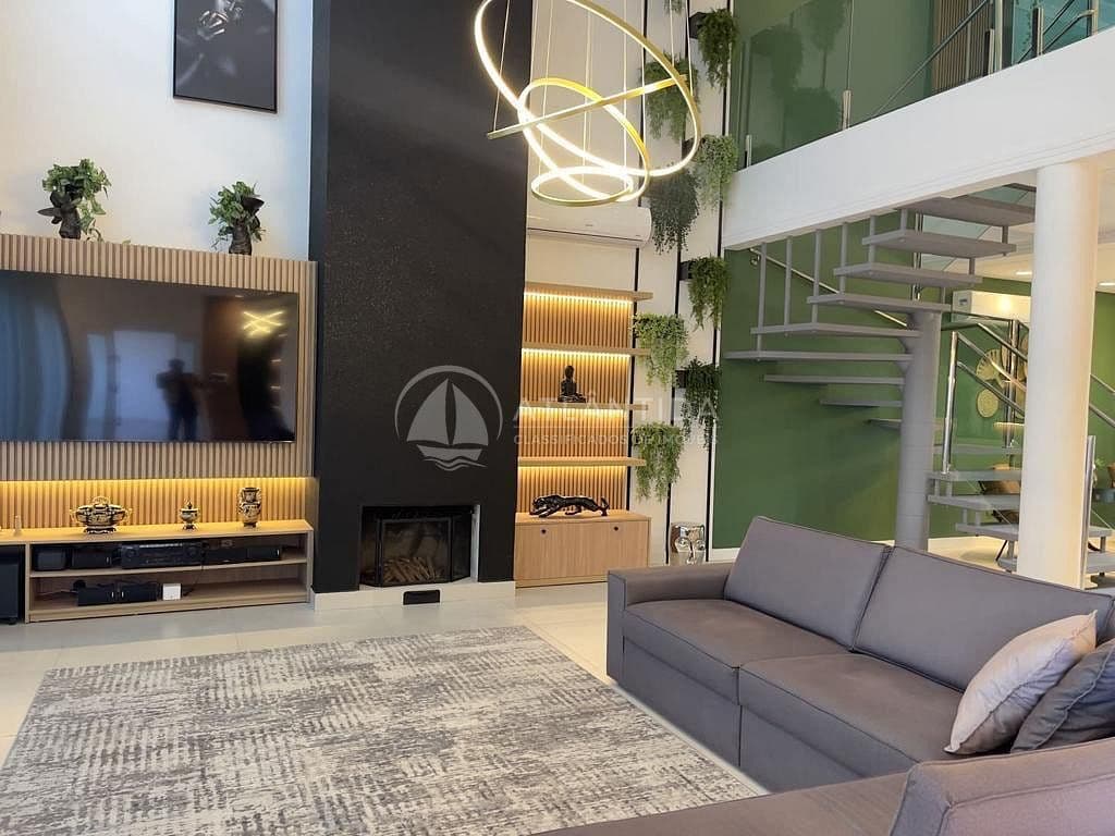 Sobrado com 4 suítes na Praia dos Amores — foto 1