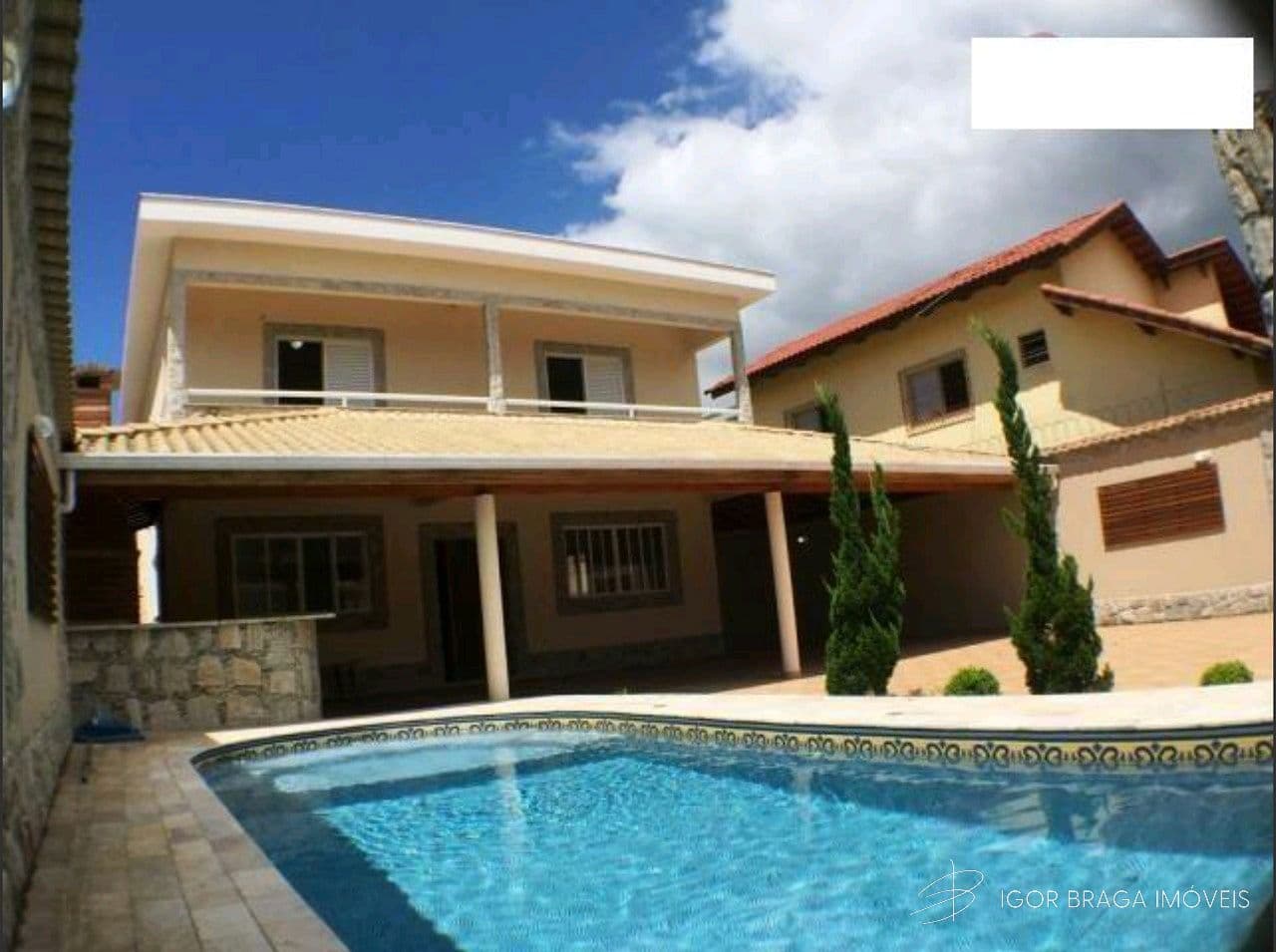 BELÍSSIMA CASA COM PISCINA E LAZER COMPLETO — foto 1