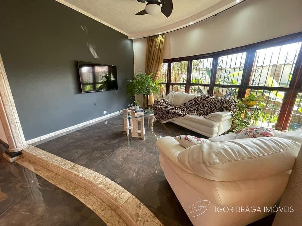 BELÍSSIMA CASA COM AMPLO QUINTA E AREA GOURMET — foto 1