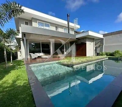 Casa à venda em Jurerê Internacional,Floriaópolis/SC, com 4 suítes, piscina, área gourmet, mobiliada e 389 m² privativos. Porteira fechada. — foto 1