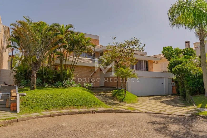 Casa mobiliada com 5 suítes a poucos metros da praia em Jurerê Internacional/SC — foto 1